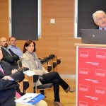 Antonio García, entre el público, junto a Juan Emilio Feliu durante su intervención